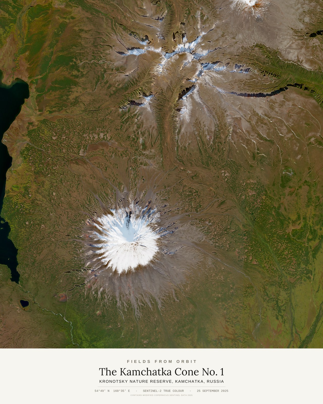 The Kamchatka Cone No. 1 — satellite art poster of Kronotsky Nature Reserve, Kamchatka, Russia, shown with its museum label